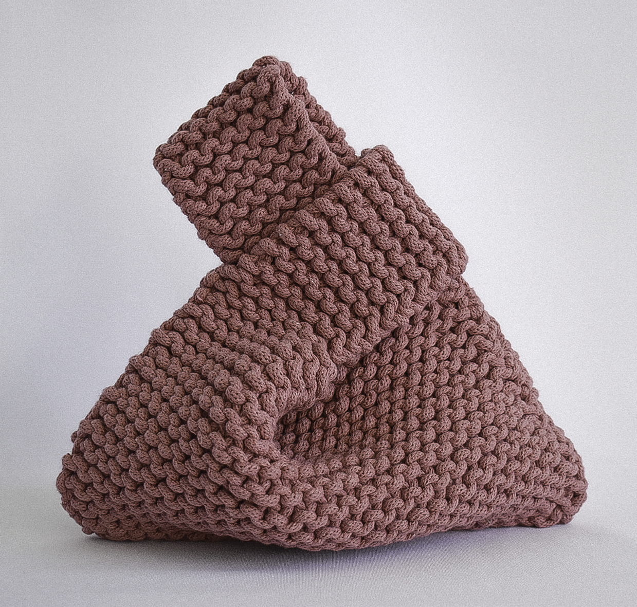hand knitted knot bag, made with 100% recycled cotton textiles