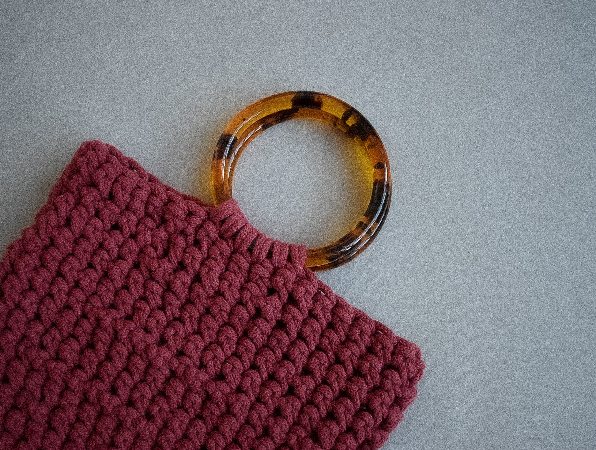 Crocheted hand bag, made with 100% recycled cotton textiles