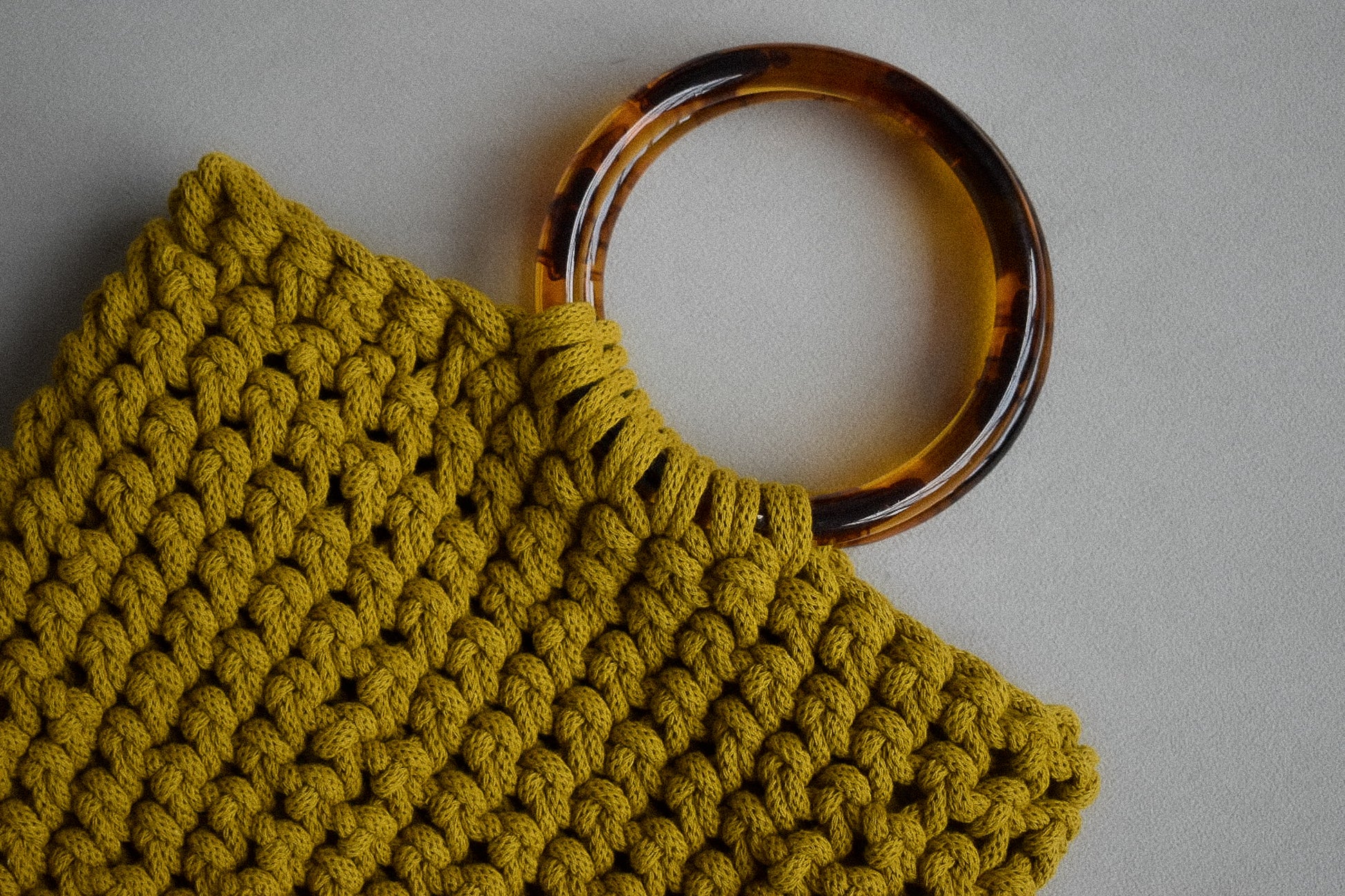 Crocheted hand bag, made with 100% recycled cotton textiles