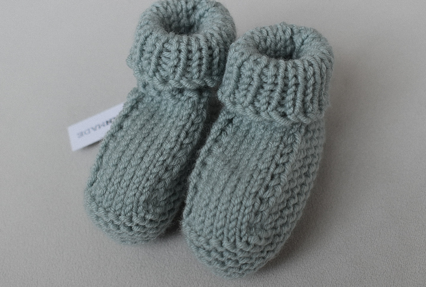 Super soft baby booties, hand knitted in Scotland with 100% merino wool