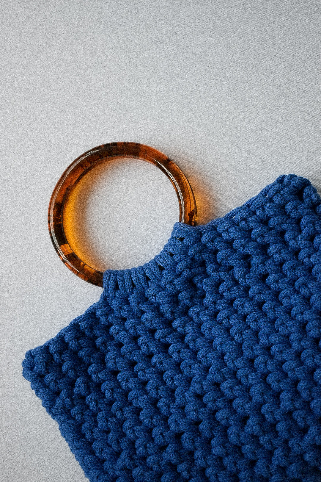 Crocheted hand bag, made with 100% recycled cotton textiles