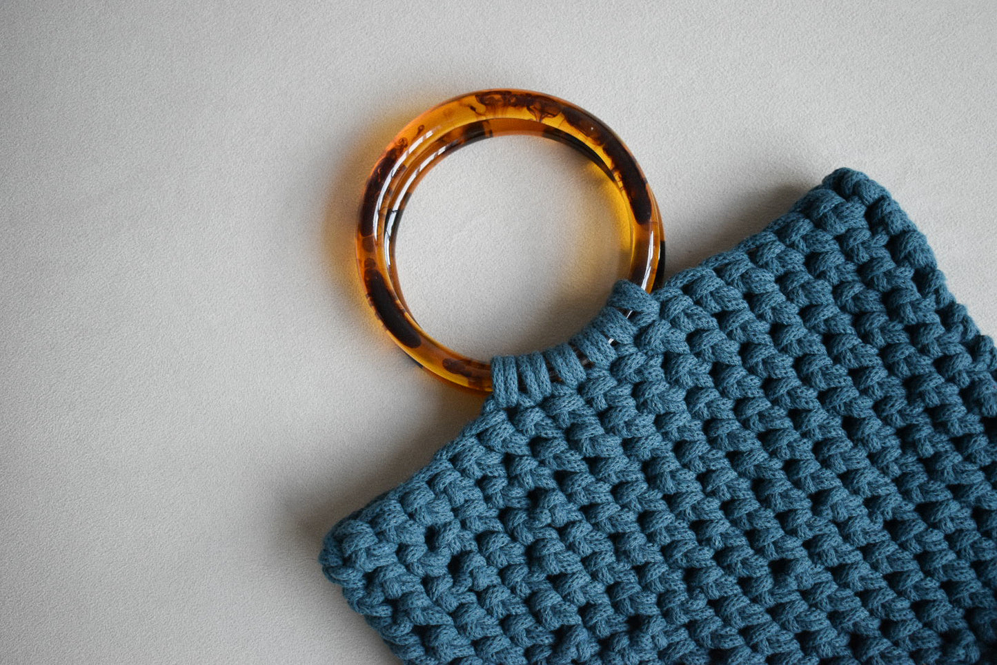 Crocheted hand bag, made with 100% recycled cotton textiles