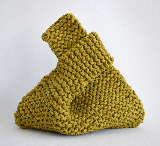 hand knitted knot bag, made with 100% recycled cotton textiles
