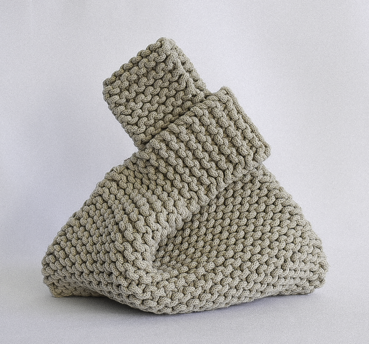 hand knitted knot bag, made with 100% recycled cotton textiles